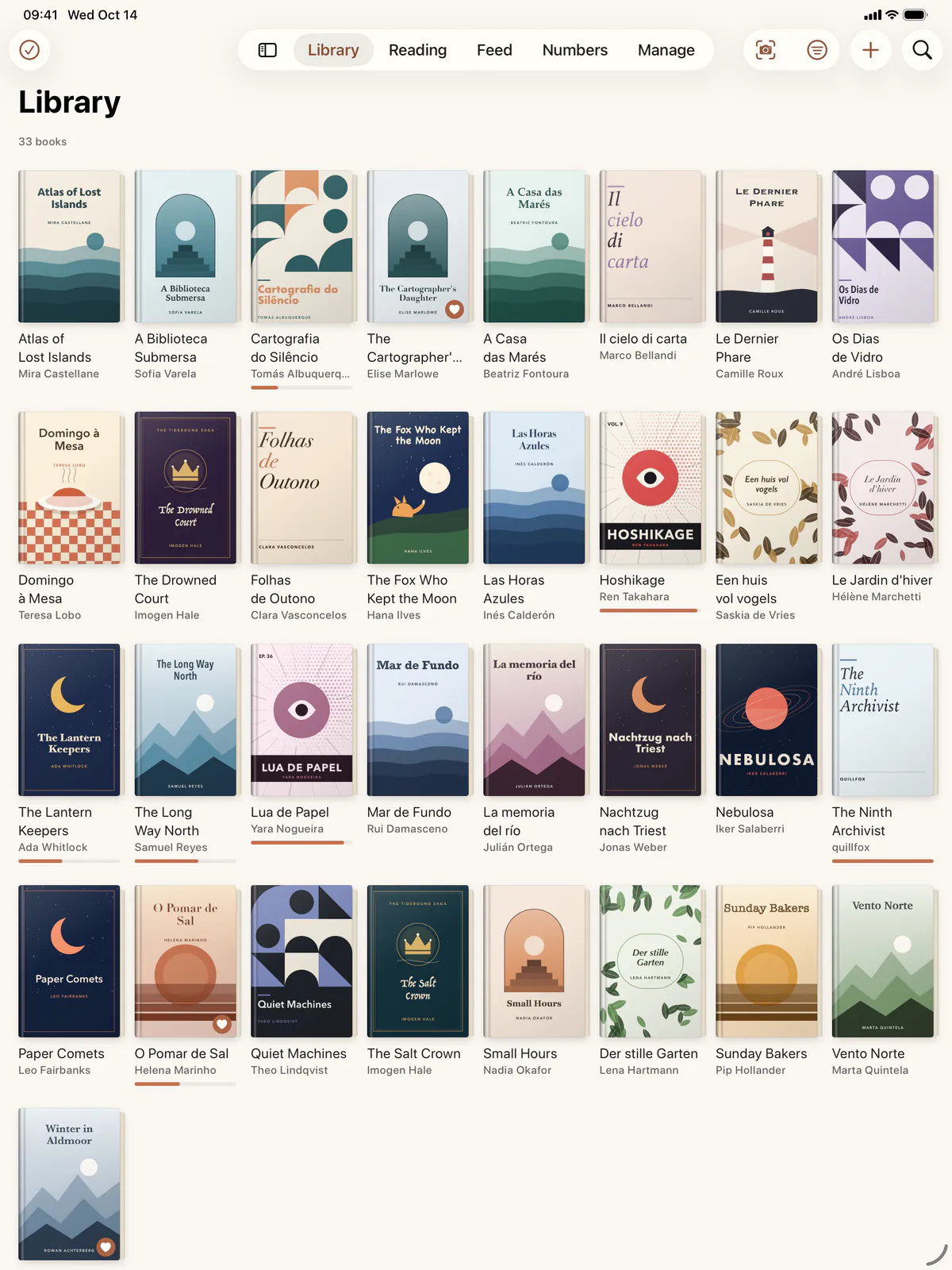 The Library on an iPad: a wide grid of covers under the tab bar.